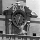Smoke rises from the sniper’s gun as he fired from the tower of the University of Texas administration building in Austin, Texas, on crowds below on August 1, 1966. Photo via AP.